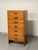 A tall chest of drawers/"seventiera" (high chest of drawers) from the 1950s, made in Italy, with clean, functional lines....