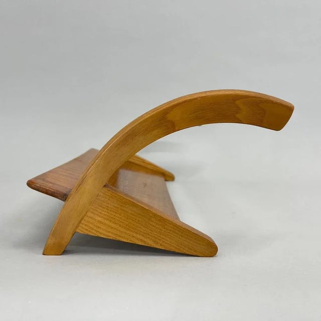 Beautiful wooden book stand shelf made in former Czechoslovakia in the 1970's by ULUV. This piece is attributed to the...