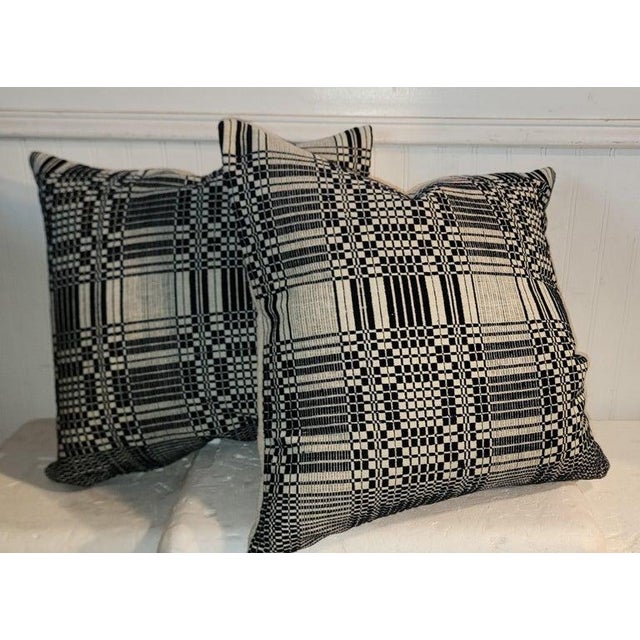 Collection of five double weave / coverlet custom made pillows with homespun linen backings.The inserts are down & feather...