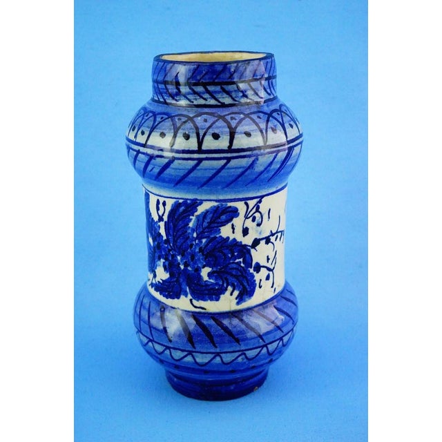 Measurements: height: 16.5 cm; diameter: 8.5 cm; weight: 0.463 kg item : a fine albarello, a majolica apothecary jar with...