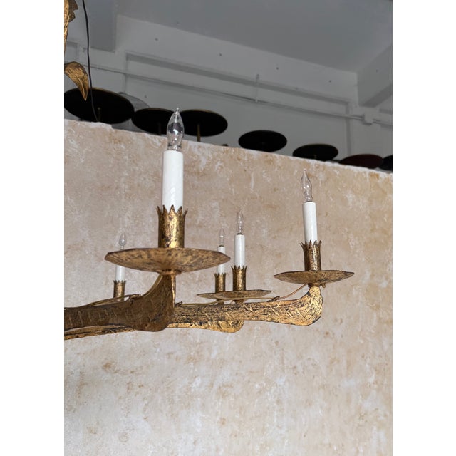 Metal Spanish 1950’s Gilt Iron Twelve-Arm Chandelier With Opaline Glass Center Light For Sale - Image 7 of 18