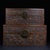 A beautifully crafted set of two Chinese hardwood nesting boxes, likely made of Huali (rosewood). Each box features deep...