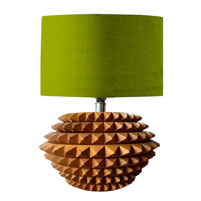 A striking sculptural statement, this 1970s artisan-made sawtooth lamp is crafted from stacked, hand-carved wooden discs,...
