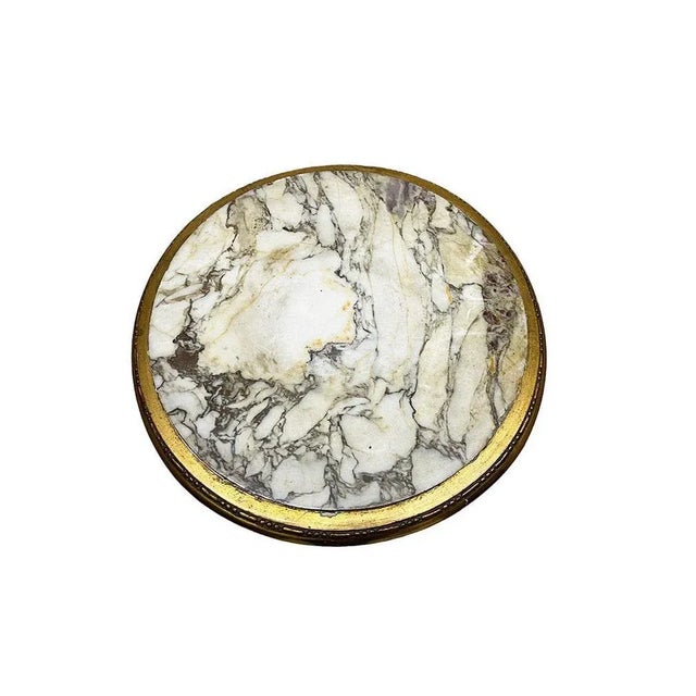 Gilded wooden side table with marble top French round gilded wooden table with marble top on fluted legs and rattan woven...