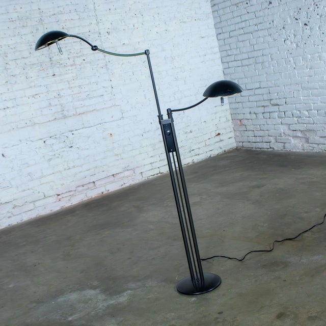 Marvelous vintage Postmodern floor lamp Model 2505 by Holtkotter Leuchten composed of a pharmacy style black metal frame...