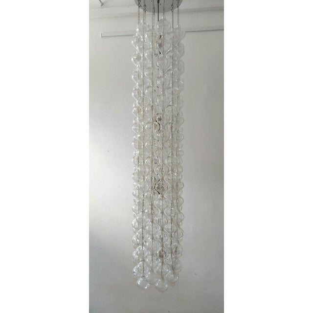 Exclusive and unusually large Kalmar Tulipan ceiling lamp. 186 mouth -blown glass elements are arranged 12 rows. Of course...