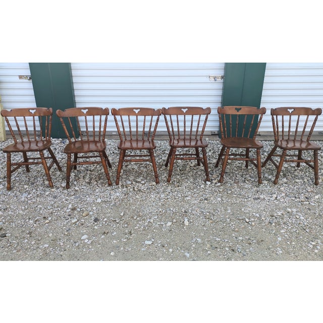 Vintage solid hard rock maple dining chairs with cushions are sturdy and are in good shape. They have a few imperfections....
