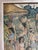 This vintage artwork is a Balinese Ubud-style painting depicting a traditional market scene.It is rendered in a muted...