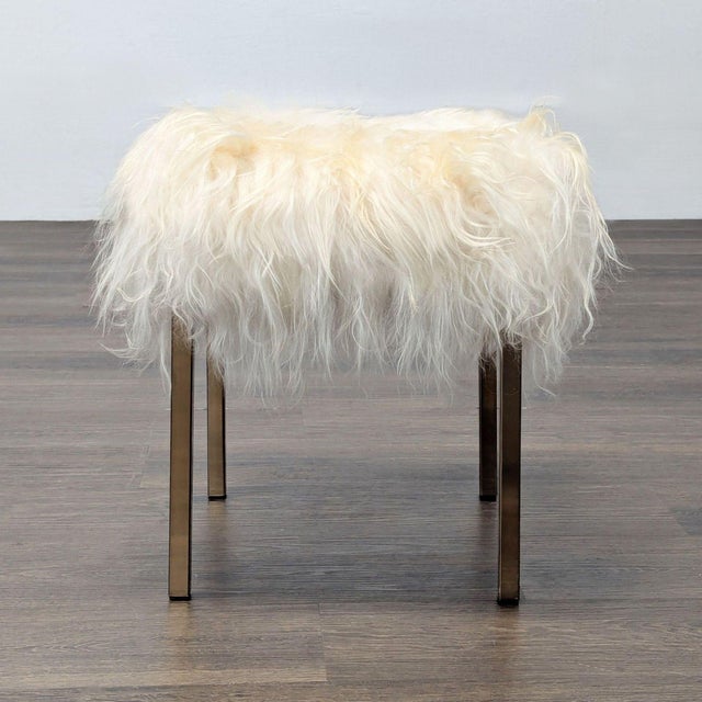 Metal legs. Brand: CB2. Original Price: $698. Dimensions (in): 14W x 14D x 17H.