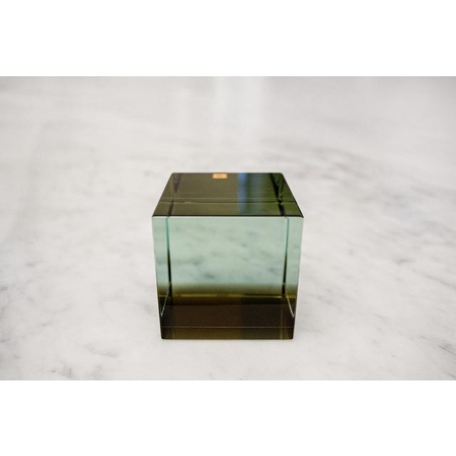 Solid glass paperweight cube. "Solidi" series Manufacturer: Fontana Arte 1980s This piece has an attribution mark, I am...
