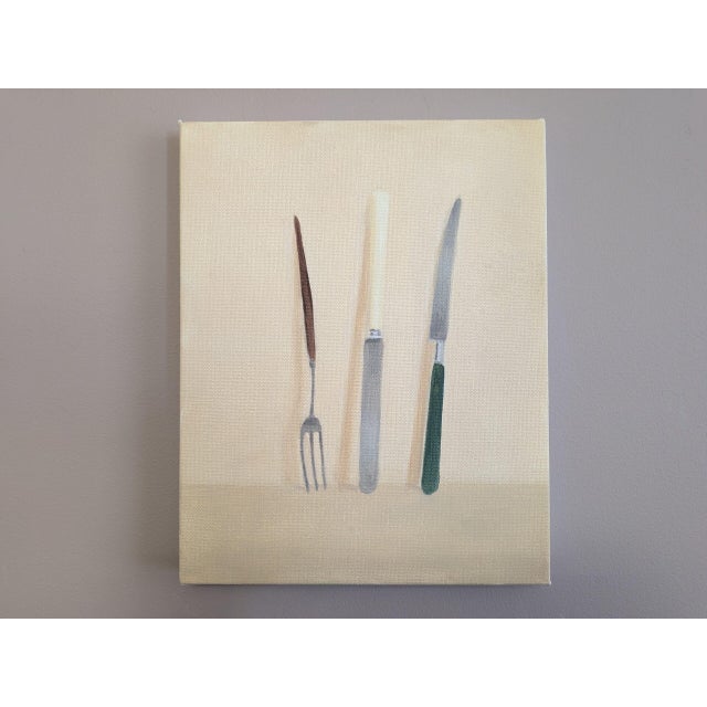 KNIVES AND FORKS NO.6 Size: 11 x 8.1 inches (including frame) Oil on canvas Bristol-based artist Brendan Lancaster finds...