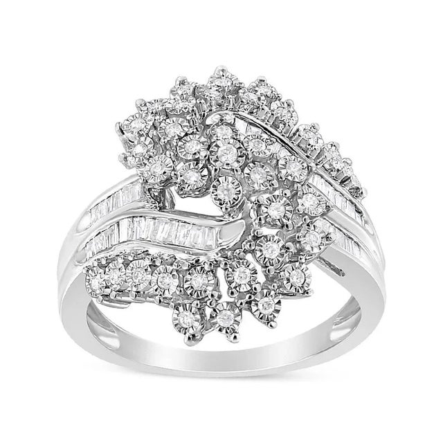 This gorgeous cocktail ring is created with a unique crossover design that boasts beautiful diamonds and stunning .925...