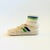 A vintage hand made crochet tennis shoe. The ankle part is hollow for storing items. Measures 8.25"W x 3.5"D x 5"H