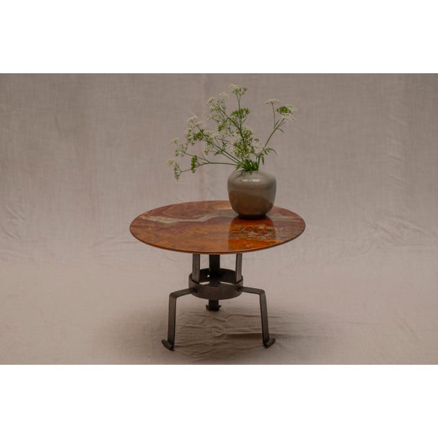 Exceptional Dutch brutalist side or coffee table, handcrafted circa 1970. This sculptural piece features a hand beaten...