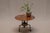 Exceptional Dutch brutalist side or coffee table, handcrafted circa 1970. This sculptural piece features a hand beaten...