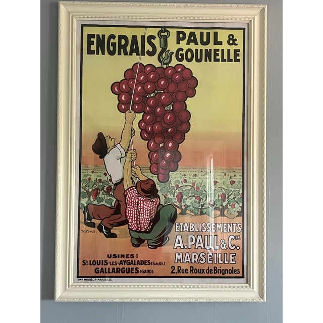 A bold graphic French advertisement from the 1980s — “Engrais Paul & Gounelle” by Viano, framed and ready for display as...