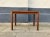 - A Swedish small coffee or side table - Dates from the 1970s - Features rounded corners, profiles, and solid oval legs -...