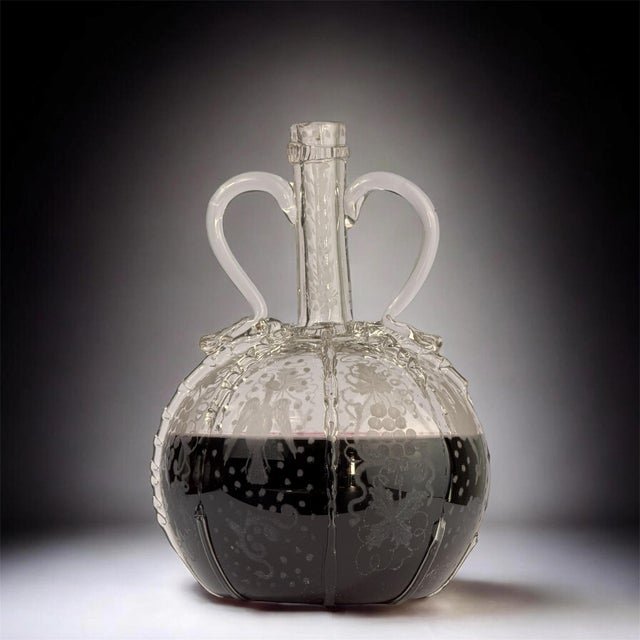 Exceptional 18th-century Dutch glass decanter, hand-blown and richly decorated with traditional wheel-engraved motifs of...