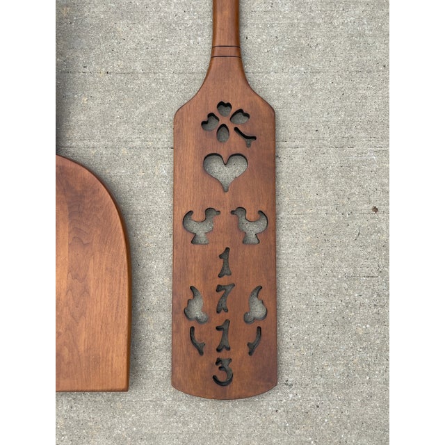 Beautiful maple wood carved boat oar made by the Tell City Chair Co. The carved designs include the year 1713, ducks, a...