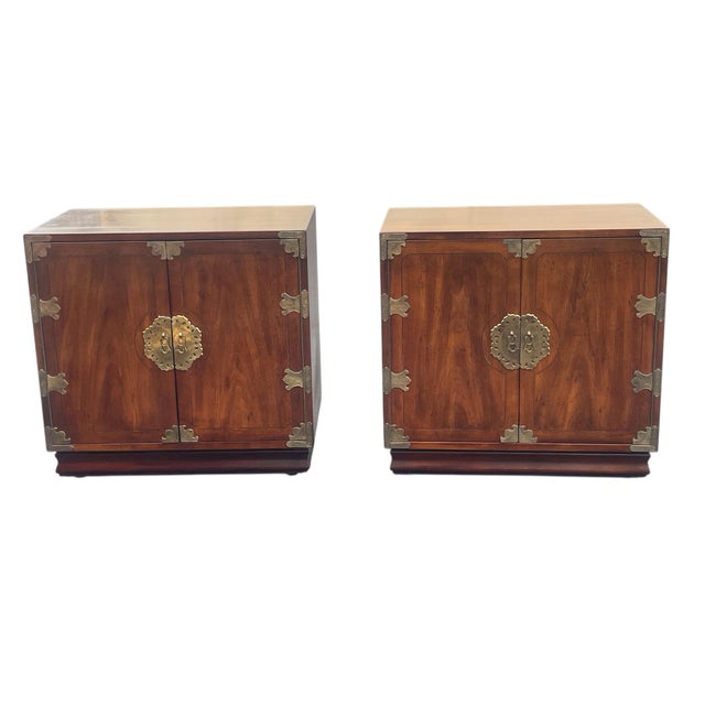 A beautiful pair of 2 door cabinets. From the very desirable Pan Asian line by Henredon. A matched pair each measuring 29”...
