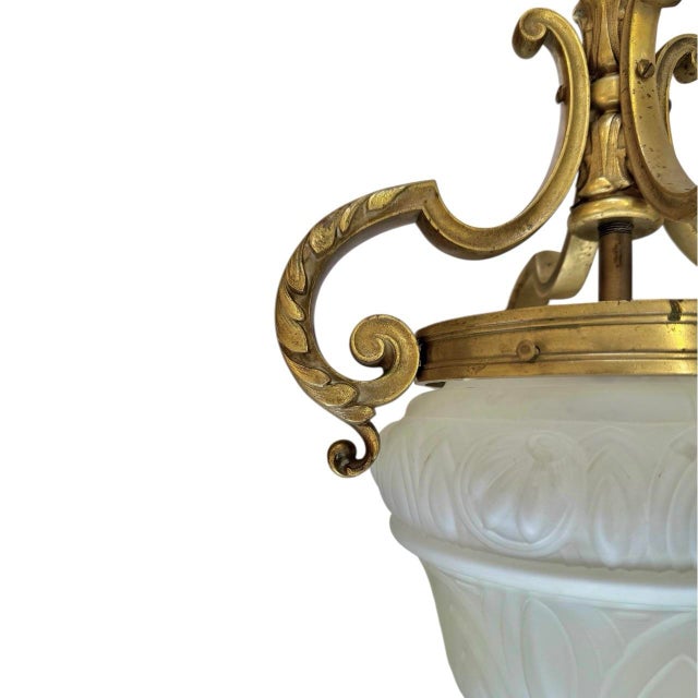 England C. 1910 Edward F. Caldwell and Co. (Attrib.) Gilt Bronze A finely-cast bronze pendant light attributed to the...