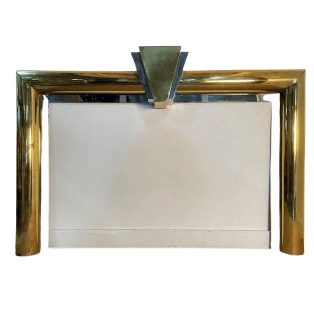 The mid century Danny Alessandro fireplace mantel is a striking fusion of brass and steel, creating a bold, contemporary...