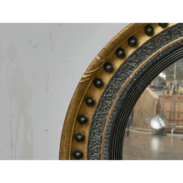 English Giltwood Convex Mirror With Ebonized Bosses, 19th Century For Sale - Image 10 of 14