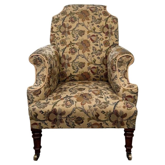 A handsome and beautifully crafted 19th-century Victorian wingback armchair, combining generous proportions, traditional...