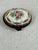 Vintage hand painted Limoges oval box decorated with a floral spray. This is a pre-owned item so please see all pictures...