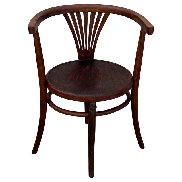 Elegant bentwood dining chair was originally designed by Thonet-Mundus in 1904 as model No. 28 - one of the company’s most...