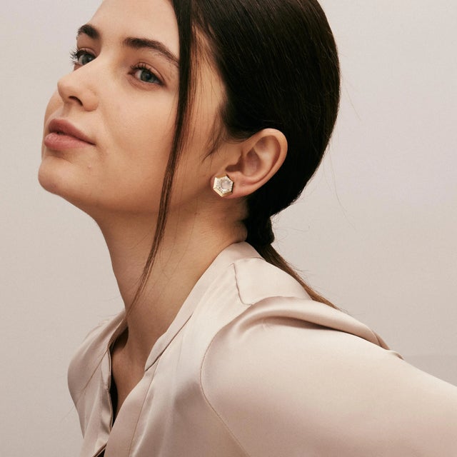 Created in 18 karat yellow gold Moon quartz 4 carats approx. Diamonds 0.50 carat approx. 18kyg butterfly backs Limited...