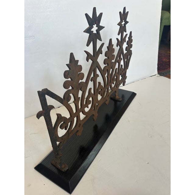 Fascinating found object sculpture having vintage iron fragment of an old fence or gate, mounted and now a piece of art. SW