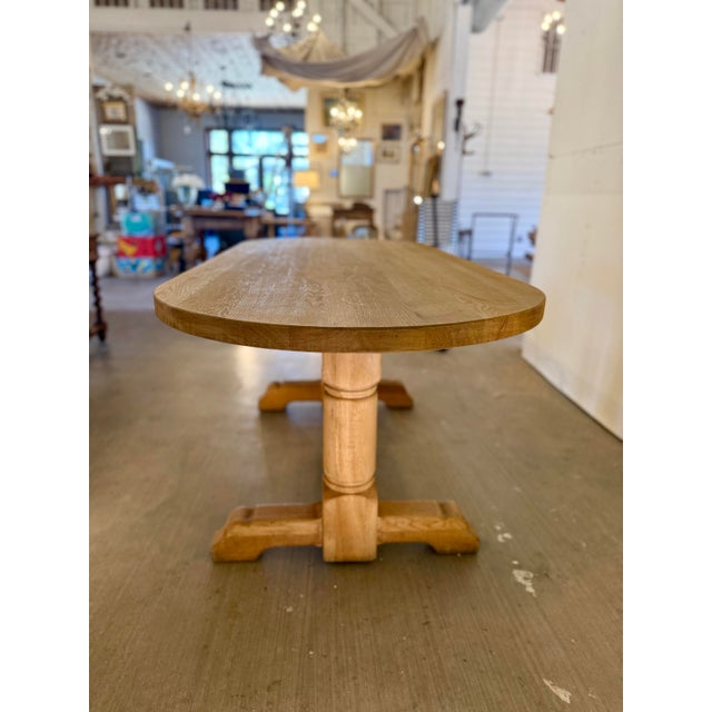 Discovered in Belgium, this vintage French oak table is solidly constructed and features the original wood. Crafted to be...