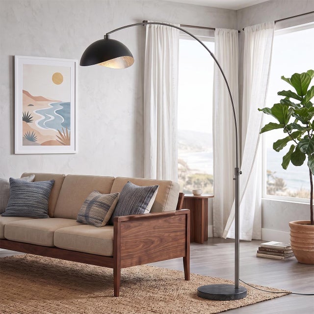 The Luna Bella Arc Lamp is a striking modern lighting piece designed by Peter Morelli in 1960. This 92-inch tall lamp...