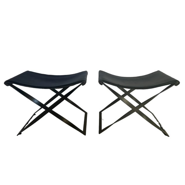 This set of stools feature a leather seat for timeless beauty and a steel base design for an architectural element. These...