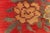 This striking antique Bessarabian rug from the 1920s showcases the region's signature floral artistry rendered in bold,...