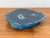 A polished blue agate mineral slab with natural banding, a small accent with many potential uses, like a coaster or a tiny...
