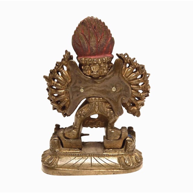 An unusual Sino-Tibetan gilt and painted bronze statue of Vajrabhairava with consort Vetali dating from the 18th or 19th...