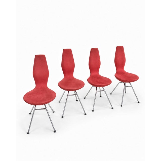 Set of 4 Date chairs designed by Olav Eldøy for the Norwegian firm Stokke in the 1990s. One-piece frame with original red...