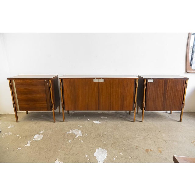 Set of three rosewood sideboards from the Taormina series, designed by architect Ico Parisi for Mim of Rome in 1958. It...