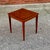 The Frame: Features Hansen's signature tapered legs and angular, seamless mitered joints linking the legs directly to the...