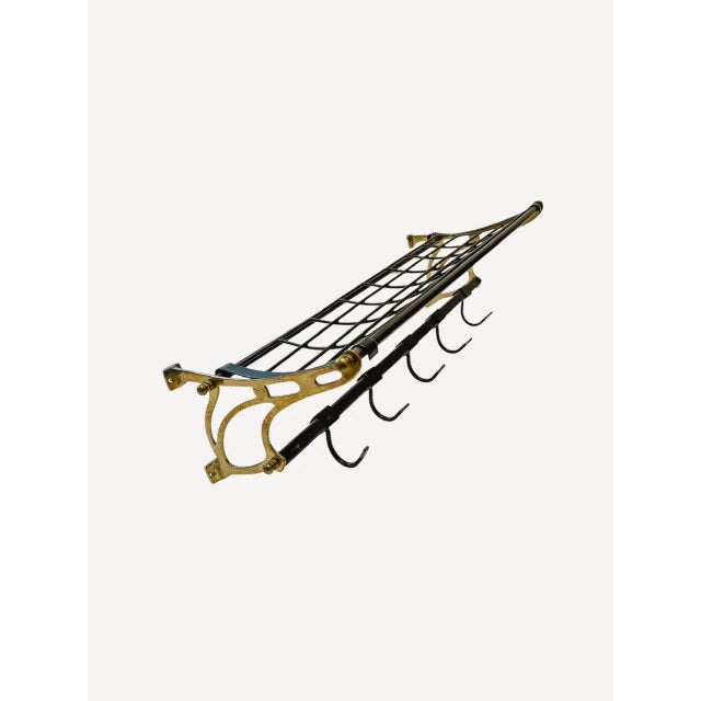 Beautiful Art Deco style wall mounted coat rack with hat rack, made from brass and black-coloured metal with 5 sliding...