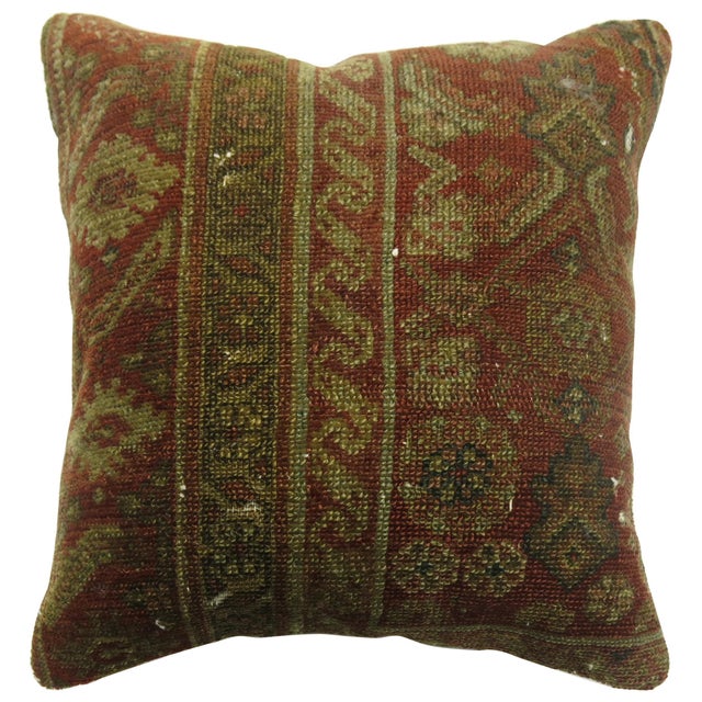 Pillow made from a 20th century Persian rug in rustic tones Measures: 15" x 16".