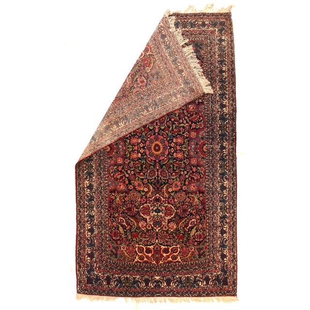 This relatively early, Interwar large scatter eschews the usual medallion pattern for a dense allover pattern based on...