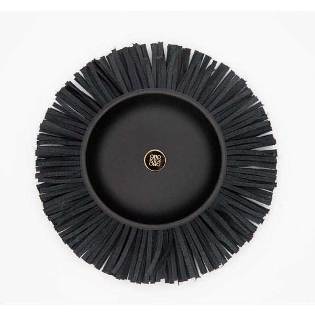 Loewe Tassel Box - Black - 4" A round ceramic box with a lid in calfskin and fringed leather. Lined in calfskin embossed...