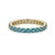 Capture the mesmerizing, electric hues of a crystal-clear tropical sea with this radiant full-eternity band. Masterfully...