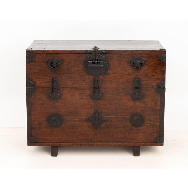 Korean Iron Mounted Hardwood Chest, with fall front door and central false bottom. 33.5" H x 41.75" W x 18.5" D....