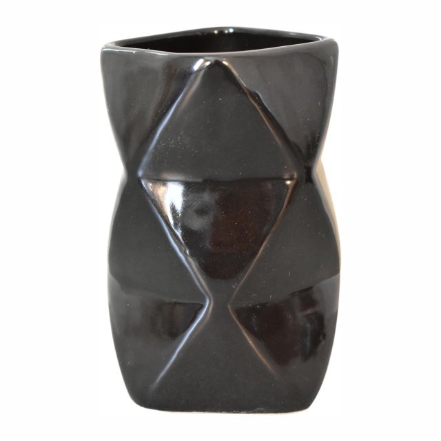 Glossy black porcelain set includes soap dispenser, dish, and toothbrush holder. Handcrafted finish means each piece has...