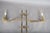 A rare and highly collectible pair of articulated brass wall lamps attributed to maison jansen, the iconic parisian design...