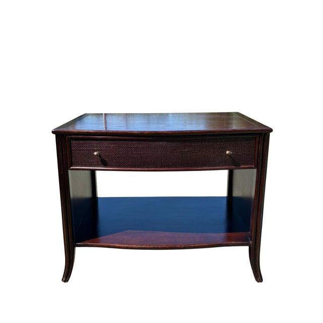 Elegant pair of Barbara Barry for McGuire Furniture Caned Bedside Tables, featuring Barbara Barry’s refined interpretation...